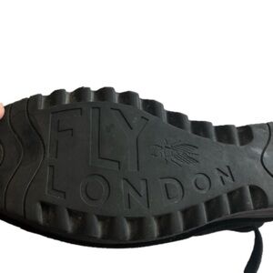 Fly London Size 40(9) Yama wedge heel ankle bootie. Black suede gripper tread